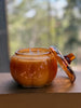 Glass pumpkin jar candle